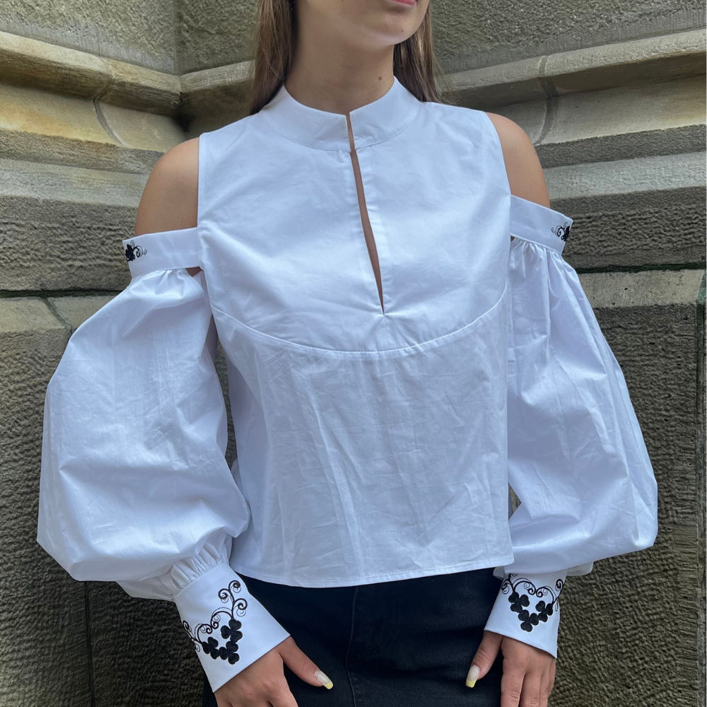 Elegante Blusa Blanca con Mangas Abullonadas